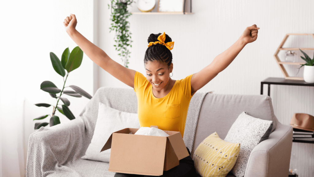 Transforming Shopping into a Social and Fun Experience! 1 A female college student with a bright smile opens a gift box filled with excitement. The box, purchased by her thoughtful mom through CoCarting.com, contains exactly what she had been longing for. Her eyes light up as she discovers the cherished item inside.