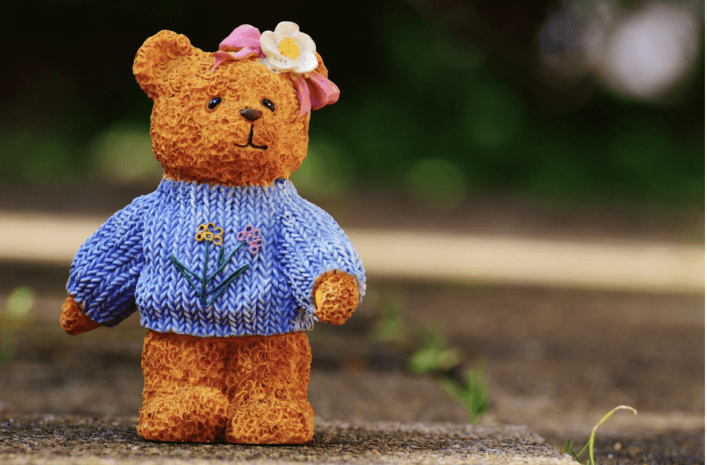 The Timeless Comfort Of Teddy Bears 47 small brown teddy bear with a blue shirt and flow in fur